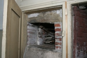 Old Kitchen, bake oven. Originally a removable door would have covered the opening to the beehive oven to trap the heat in it when in use.