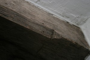 Room 201, hall chamber. chamfer stop at the north end of the summer beam.