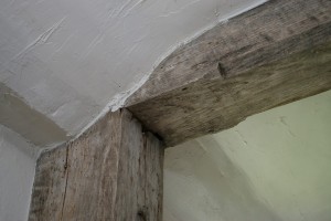 Room 101, Hall Chamber. Detail of post head and summer beam. 