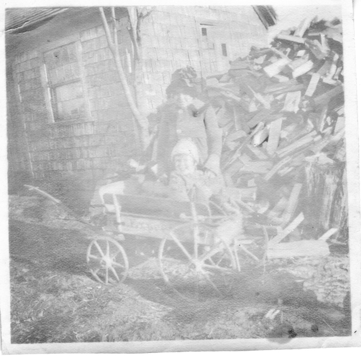3-23-1921-Woodpile-beside-house-woodshed