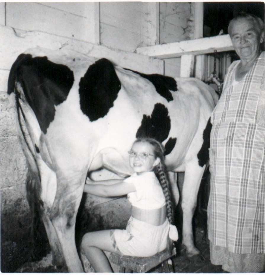 Photo-1-Granddaughter-Frances-milking-cow-with-Grandma-Zembo-c.-1952