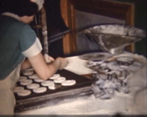 Jeannette Butler hand cutting donuts